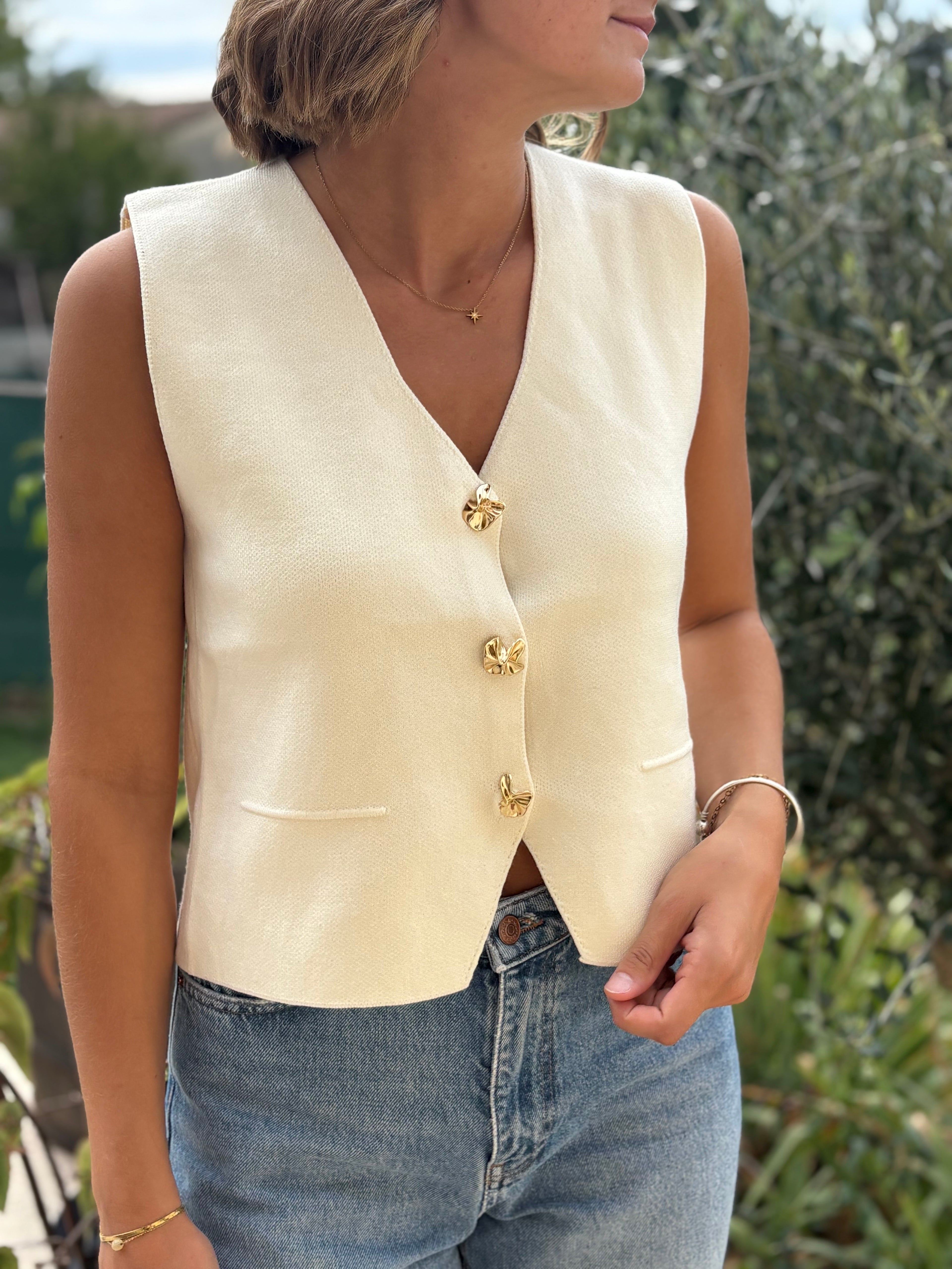 Gilet sans manches à boutons