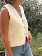 Gilet sans manches à boutons