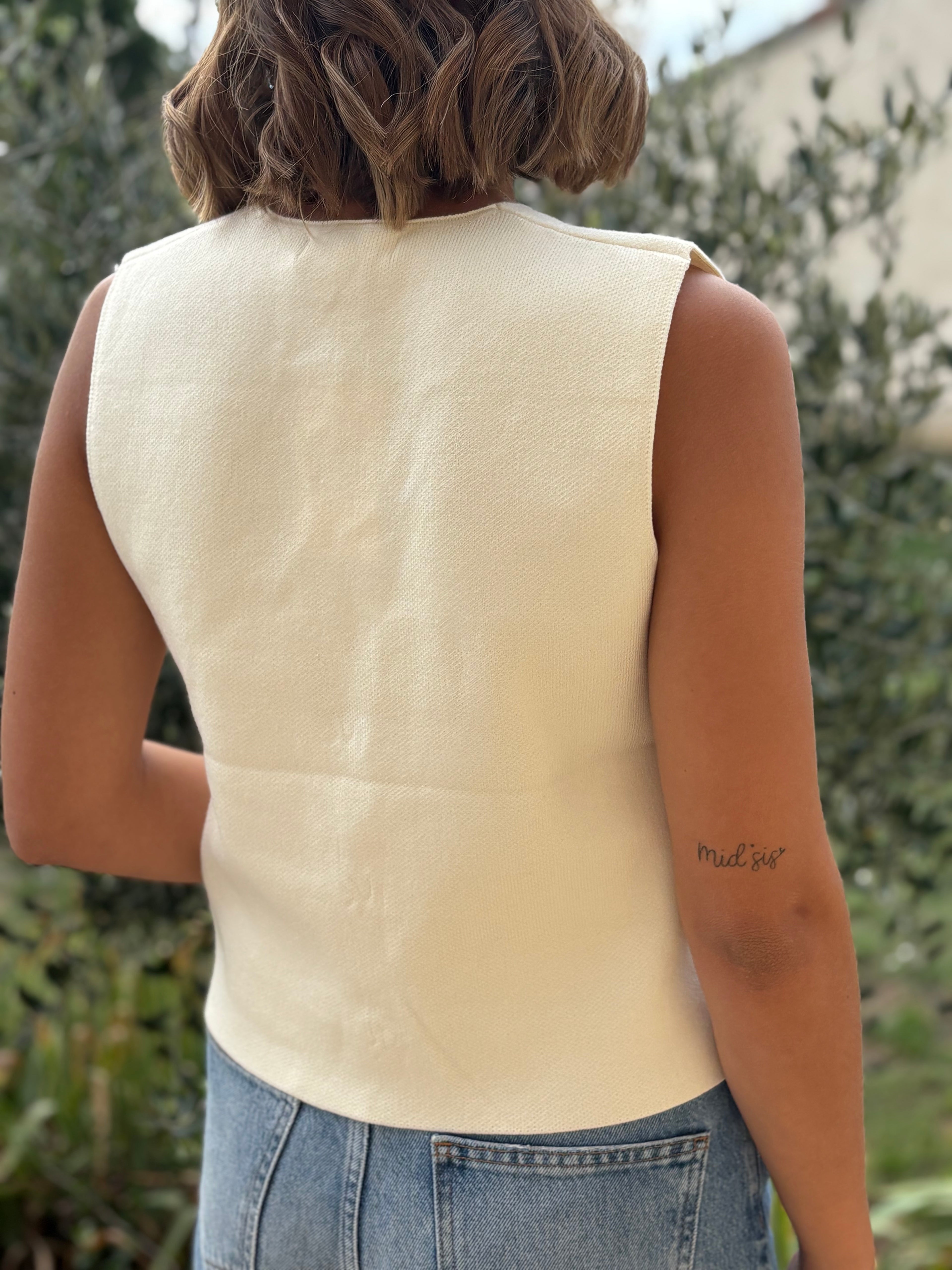 Gilet sans manches à boutons